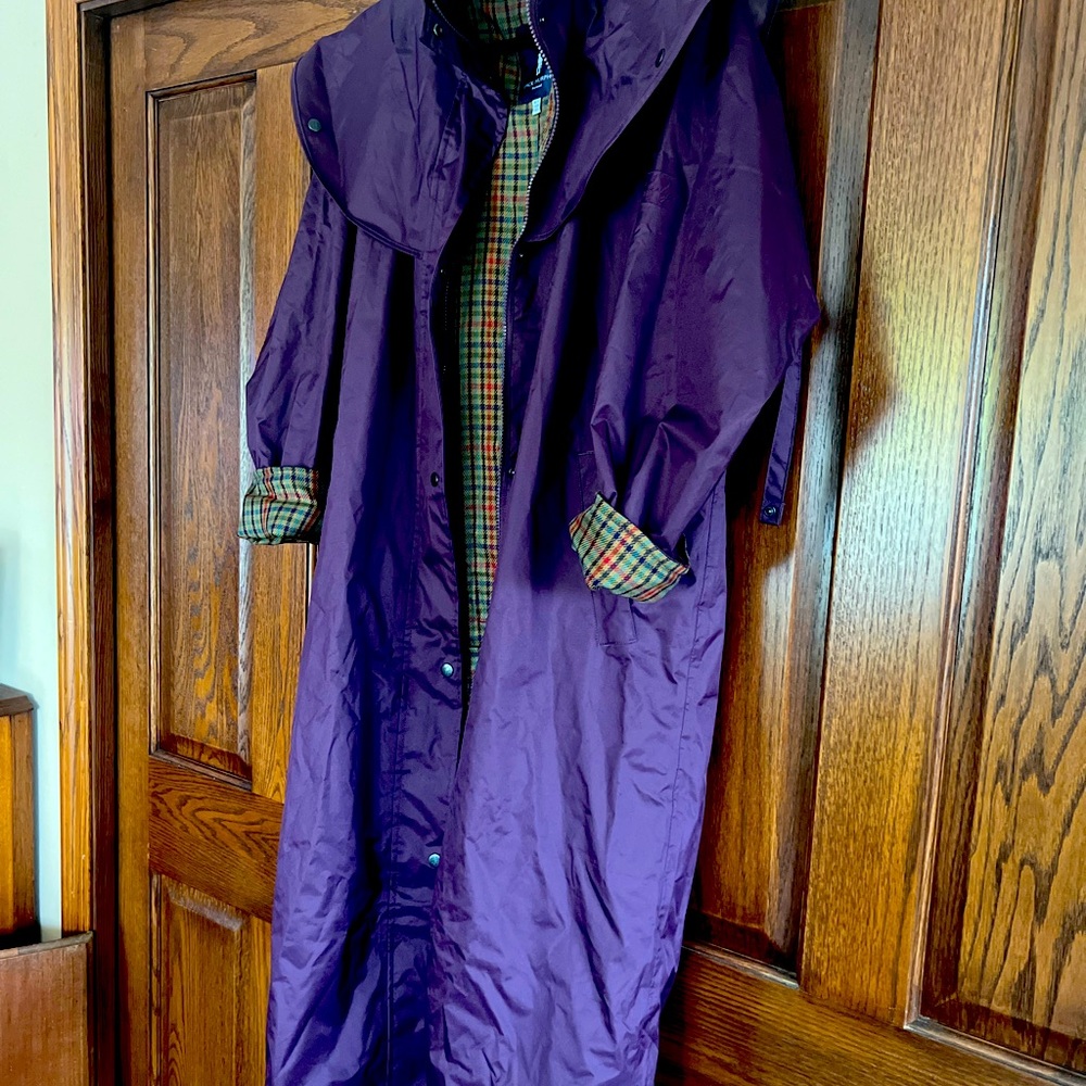 Never worn beautiful raincoat. Brand new.